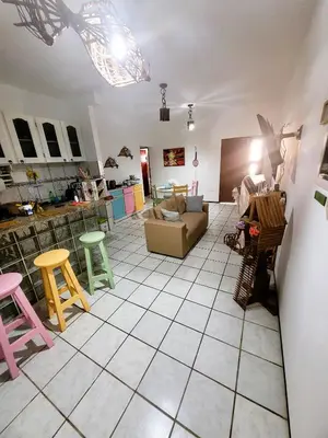 Uma área de estar em Apto pé na areia, paradisíaca praia do presídio CE