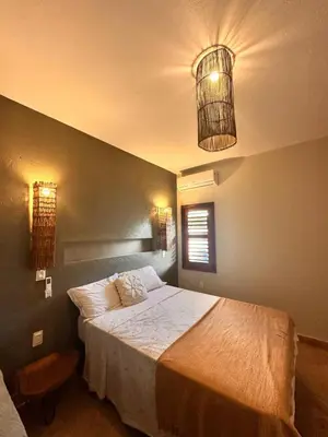 Uma cama ou camas num quarto em casa nova