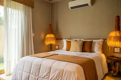 Uma cama ou camas num quarto em Casa Água - Praia do Preá