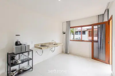 A cozinha ou kitchenette de Ed Cumbuco Real | Aptos Completos a 160m da Praia - MCUs