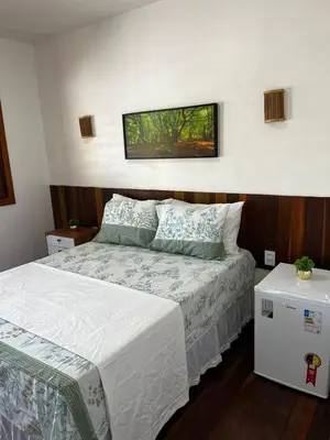 Uma cama ou camas num quarto em suite elegante fullhausi 01