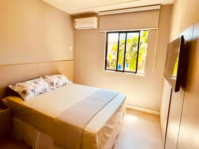 Uma cama ou camas num quarto em Studio Completo a 2min da Praia e Beach Park