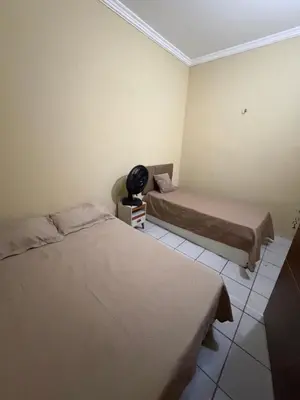 Uma cama ou camas num quarto em Sítio sonho meu