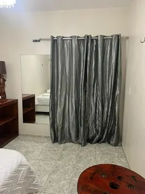 Uma cama ou camas num quarto em Suites da Ana Flecheiras