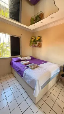 Uma cama ou camas num quarto em AP 600m from Castelão Arena-near Airport and Sarah