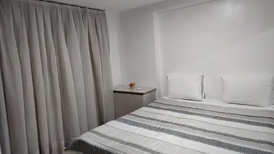Uma cama ou camas num quarto em Excelente apto confortável 4 hóspedes