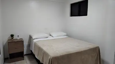 Uma cama ou camas num quarto em Excelente apto confortável 4 hóspedes