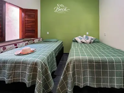 Uma cama ou camas num quarto em BECA Residencial