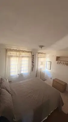 Uma cama ou camas num quarto em Vila dos Ventos Taíba