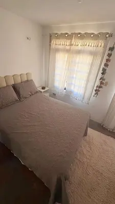 Uma cama ou camas num quarto em Vila dos Ventos Taíba