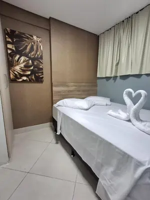 Uma cama ou camas num quarto em Apart 203 Vista Mar