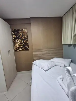 Uma cama ou camas num quarto em Apart 203 Vista Mar