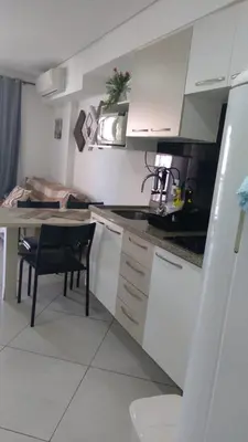 A cozinha ou kitchenette de Apart 07 Beira Mar apartment 07 ocean