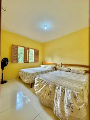 Uma cama ou camas num quarto em Casa a 6 km de Guaramiranga
