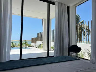 Uma cama ou camas num quarto em High End Guajiru Villa with Pool and Jacuzzi CEA48