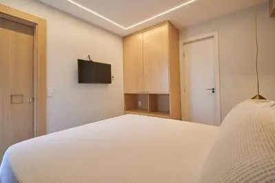 Uma cama ou camas num quarto em Apartamento Beira-mar com Academia no Mucuripe