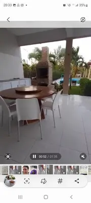 Uma área de estar em Casa da Lelê