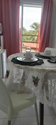 Uma área de estar em Casa da Lelê