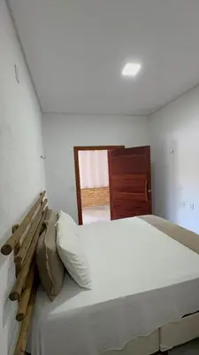 Uma cama ou camas num quarto em Casa Aura Solis Preá