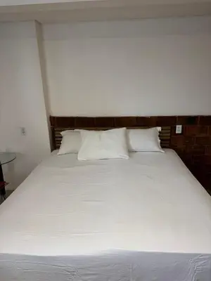 Uma cama ou camas num quarto em Casa Aura Solis Preá