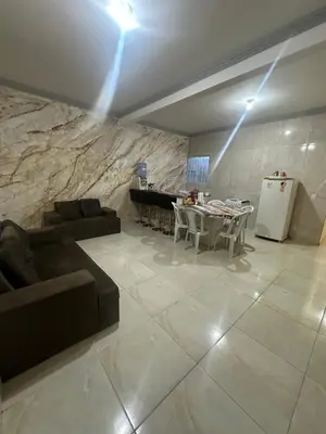 Uma área de estar em Casa Amarela no Fortim