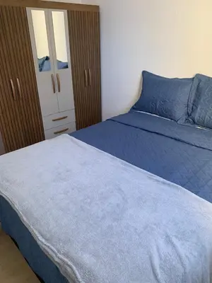 Uma cama ou camas num quarto em 2quartos vista mar Praia do Futuro
