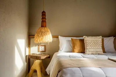 Uma cama ou camas num quarto em Casa Terra - Praia do Preá
