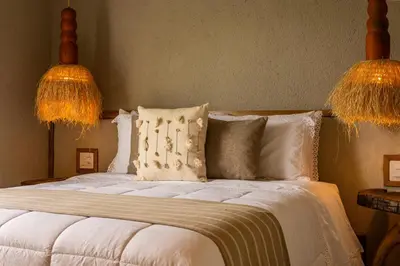 Uma cama ou camas num quarto em Casa Terra - Praia do Preá