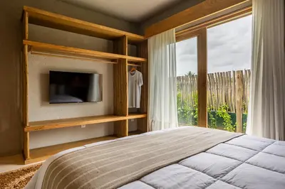 Uma cama ou camas num quarto em Casa Terra - Praia do Preá