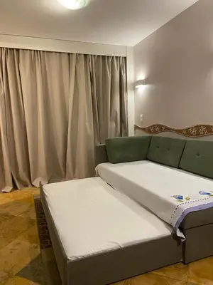 Uma cama ou camas num quarto em Suites Resort ao lado do Beach Park e Pé na areia Apt térreo adm por anfitrião