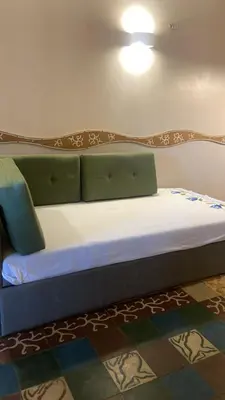 Uma cama ou camas num quarto em Suites Resort ao lado do Beach Park e Pé na areia Apt térreo adm por anfitrião