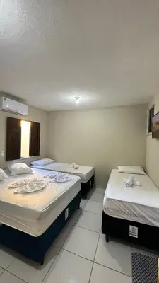 Uma cama ou camas num quarto em Garden Flat Beach
