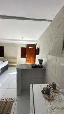A cozinha ou kitchenette de Garden Flat Beach