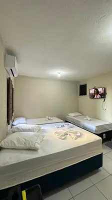 Uma cama ou camas num quarto em Garden Flat Beach