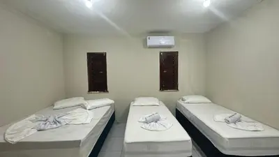 Uma cama ou camas num quarto em Garden Flat Beach