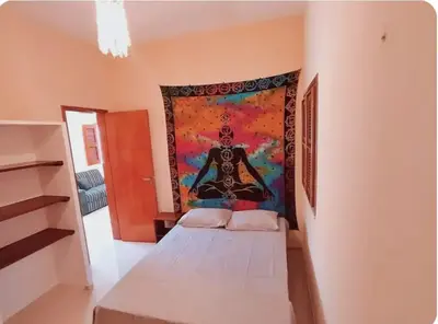 Uma cama ou camas num quarto em Conforto em Praia Paradisíaca