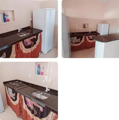 A cozinha ou kitchenette de Conforto em Praia Paradisíaca