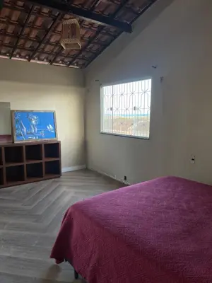 Uma cama ou camas num quarto em Casinha branca FORTALEZA