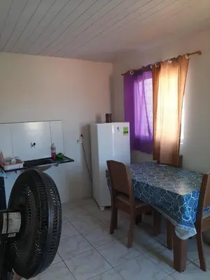 A cozinha ou kitchenette de Apartamento para 4 pessoas na rua principal de Beberibe