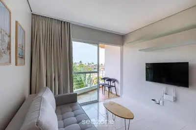 Uma televisão e/ou sistema de entretenimento em Aptos em Cond. c/ Piscina a 1 Quadra da Praia de Cumbuco - KVI