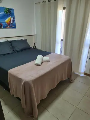 Uma cama ou camas num quarto em Dream Village 702H - Beira Mar
