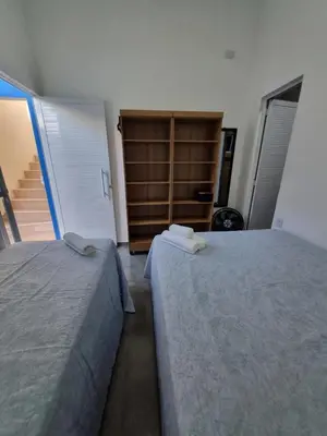 Uma cama ou camas num quarto em Casa Horizonte Azul
