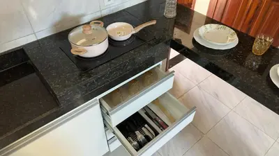 A cozinha ou kitchenette de Via do Sol flats