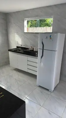 A cozinha ou kitchenette de Via do Sol flats