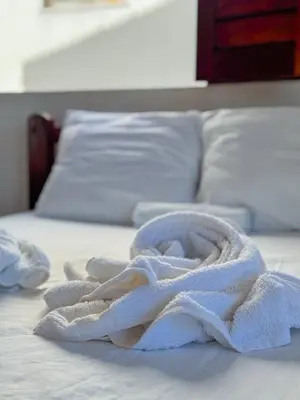 Uma cama ou camas num quarto em ALBERGUE Lagoinha