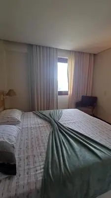 Uma cama ou camas num quarto em Kariri Beach Waterfront Retreat
