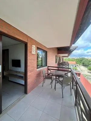 Uma varanda ou terraço em Kariri Beach Waterfront Retreat