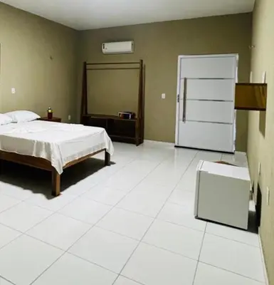 Uma cama ou camas num quarto em Pousada MR JERI
