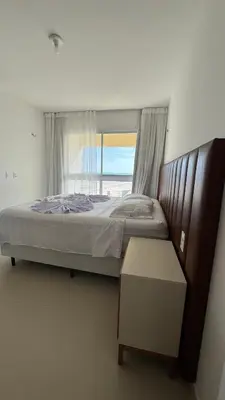 Uma cama ou camas num quarto em Apto Areia Branca Canoa Quebrada