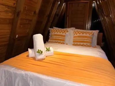 Uma cama ou camas num quarto em Chalé Cabana